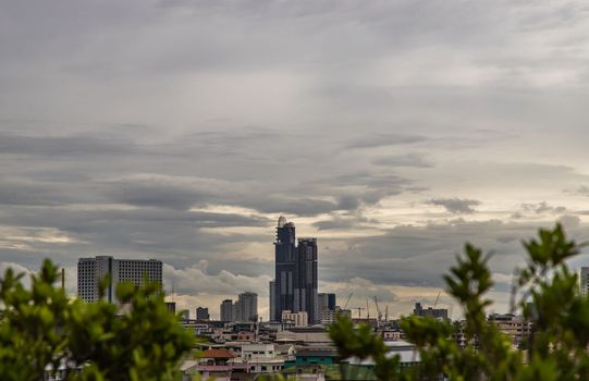 Bangkok downtown cityscape with skyscrapers at evening give the city a modern style. Selective focus.