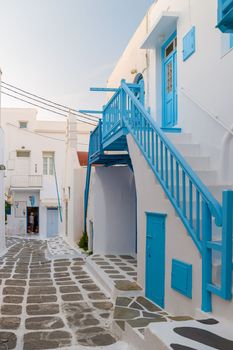 Mykonos Greece April 2018, Tourists at the streets of the Greek village in Greece, colorful streets of Mikonos village.