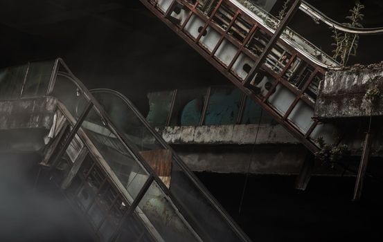 Bangkok, Thailand - 07 Feb 2022 : Damaged escalators in abandoned shopping mall building. Structural and ruins was left to deteriorate over time, New World Mall, No focus, specifically.