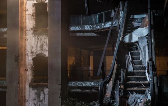 Damaged escalator in abandoned shopping mall building. Structural and ruins was left to deteriorate over time, New World Mall, Selective focus.