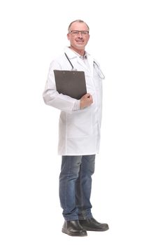 Side view of concentrated male doctor writing reports over white background