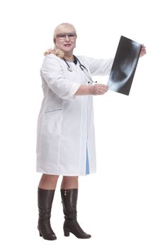 in full growth. female doctor with an x-ray . isolated on a white background.