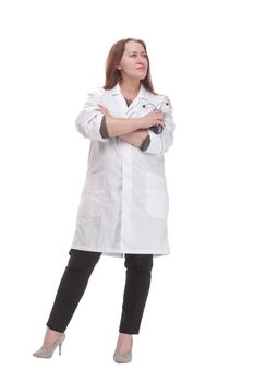 in full growth. qualified female doctor with a stethoscope in her hand. isolated on a white background.