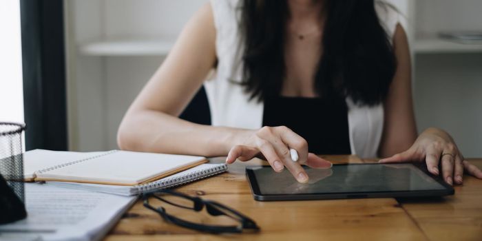 business woman holding digital tablet. Blank screen for your advertising.