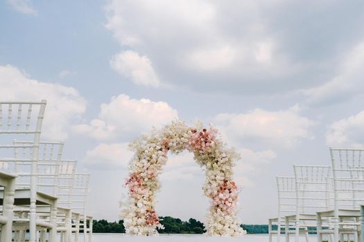 Wedding ceremony on the street on the green lawn.Decoration of a wedding celebration.