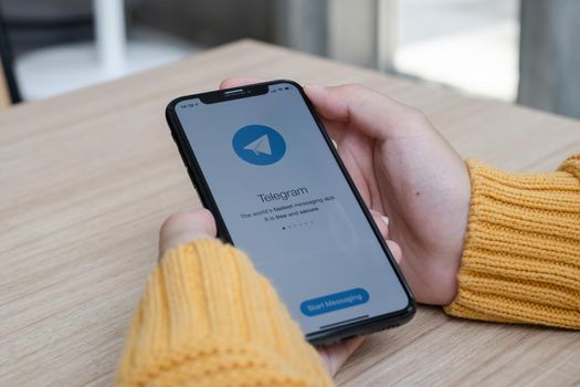 CHIANG MAI, THAILAND : AUG 17 2021 : Telegram application icon on Apple iPhone screen. Telegram is an online social media network. Social media app and Telegram app icon