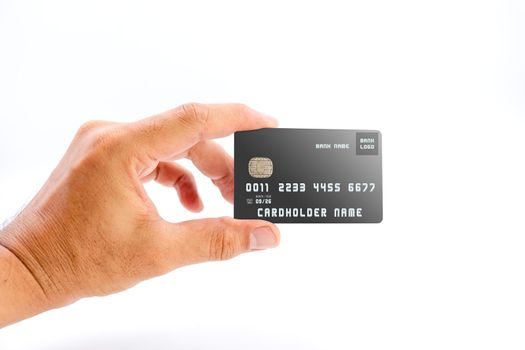 Human hand holding black color bank credit card on white background, use for business and finance concepts.