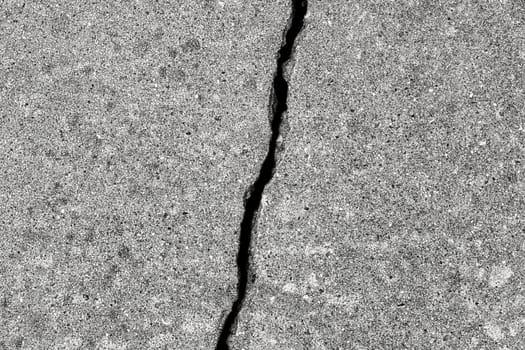 Cracked texture of gray concrete. Abstract background for design.