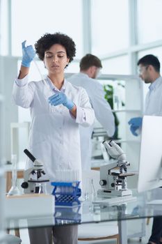 Scientists smiling together in lab