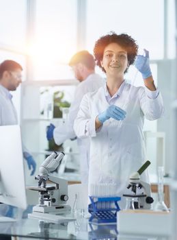 Scientists smiling together in lab