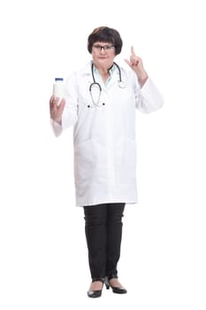 in full growth. senior female doctor with sanitizer in hand . isolated on a white background.