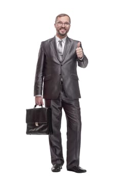 in full growth.Executive business man with a leather briefcase. isolated on a white background.