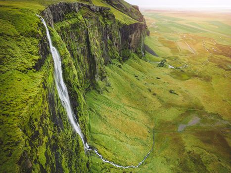 Iceland waterfall nature travel landscape in Icelandic nature background. Popular tourist attraction summer holiday destination in on South Iceland. High quality photo