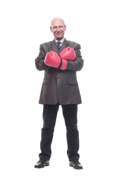 in full growth. business man in Boxing gloves. isolated on a white background.