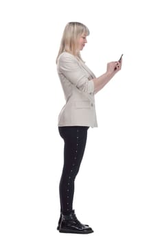 side view. casual woman choosing the right contact on her smartphone. isolated on a white background.