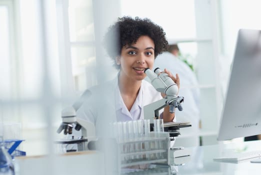 Medical Research Laboratory. Female Scientist Working with Micro