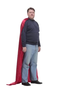in full growth. mature man in a superhero Cape .isolated on a white background.