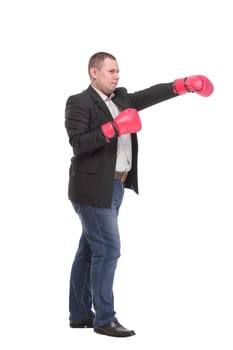 Profile of successful businessman punching and hitting with boxing gloves in full length isolated on white background, Business competition concept,