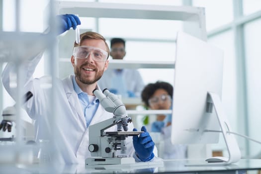 Focused male scientist working in laboratory