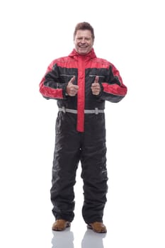 in full growth. happy man in winter insulated overalls. isolated on a white background