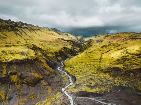 Aerial view of Icelandic riverbed. River flowing through the volcanic landscape of Iceland. High quality photo