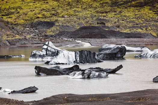 Beautiful Aerial view of the massive Glacier in Iceland and its lagoon caused by global warming -Svinafellsjokull - Jokulsarlon.