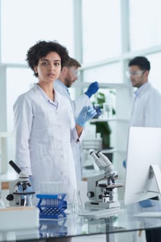 Scientists smiling together in lab