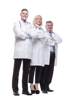 in full growth.qualified doctors colleagues standing in a row. isolated on a white background.