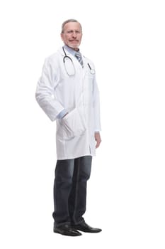 Confident mature doctor with arms crossed looking away over white background