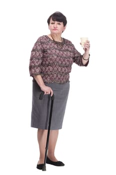 full-length. casual elderly woman with takeaway coffee. isolated on a white background.