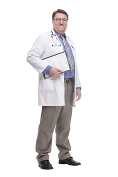in full growth. qualified doctor with a clipboard.isolated on a white background.