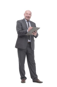 in full growth. business man with clipboard.isolated on a white background.