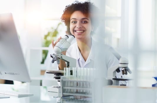 Medical Research Laboratory. Female Scientist Working with Micro