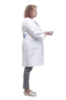 full-length. senior female doctor with a digital tablet. isolated on a white background.