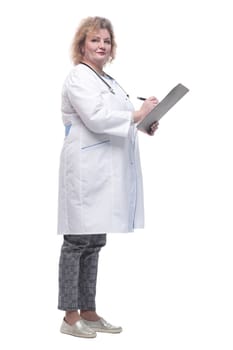 full-length. senior female doctor with clipboard. isolated on a white background.