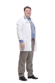 in full growth. friendly doctor in a white coat.isolated on a white background