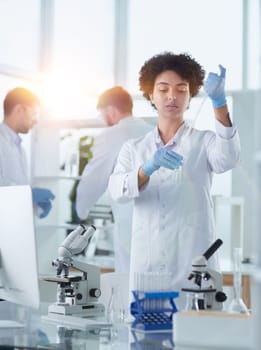 Scientists smiling together in lab