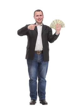 Smiling businessman in jeans with dollar money showing thumbs up. Business, people, finances and success concept