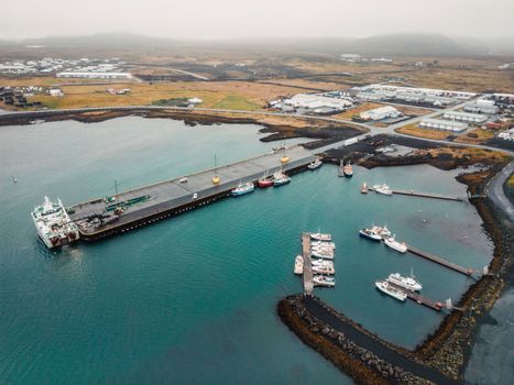 Grindavik fishing town by the sea in Iceland. Harbor by the sea. Cold autumn day in Iceland High quality photo