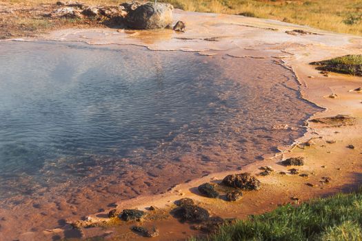 Geyser hot spring in Iceland. No people around. Hot water natural spring.