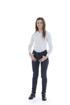 in full growth. attractive girl in jeans and a white blouse . isolated on a white background.