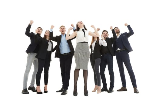 in full growth. team of young business people celebrating together .