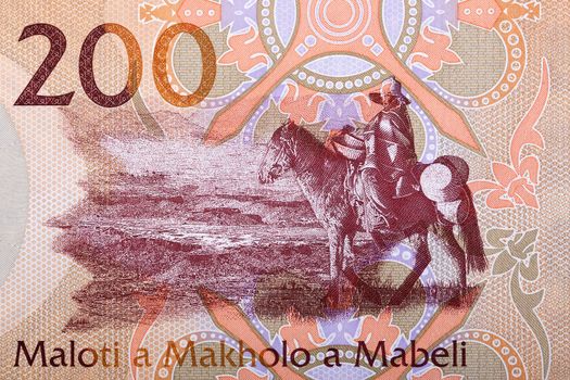 Man on horseback from banknotes of Lesotho - Maloti