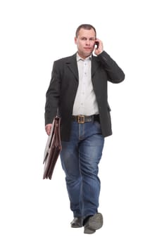 Business man Walking forward while talking on the phone over white background