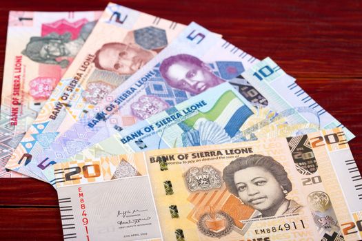 Sierra Leonean money - Leones - a business background from  new series of banknotes