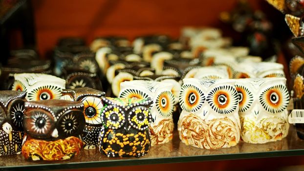 close-up, various souvenirs made of stone, wood, glass and metal, in the gift shop for tourists. High quality photo