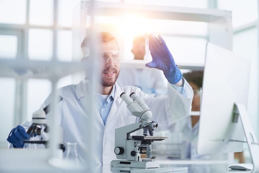 Focused male scientist working in laboratory