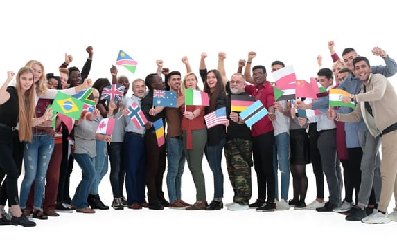in full growth. multi-ethnic group of diverse people standing together . isolated on a white background.