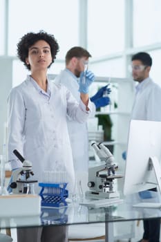 Scientists smiling together in lab