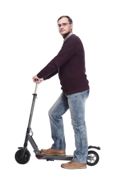 casual man with electric scooter. isolated on a white background.